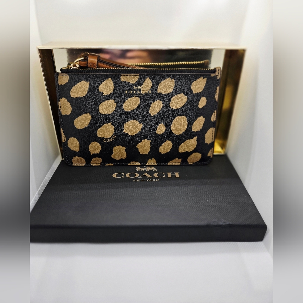 Coach Small Wristlet with Deer Spot Print.